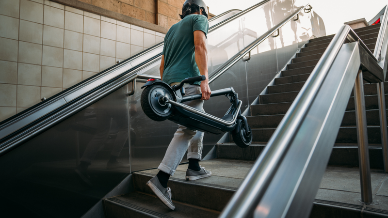 Carrying nearly 50 pounds of electric scooter with one hand seems like a Herculean task.